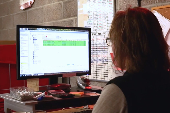 Employee using Khaos Control at her desk