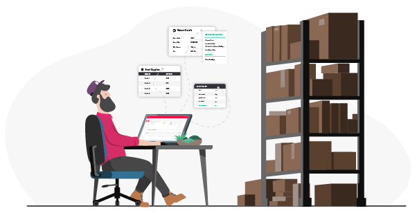 no-lazyload Person sat at a desk checking stock levels through Khaos Control.