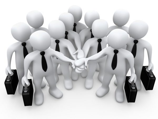 Democratic business leader graphic of people all putting their hands together